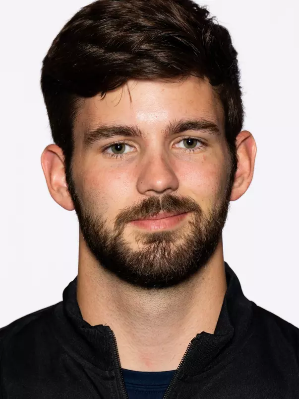 Justin Unger XC Headshot 23