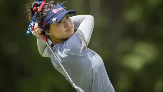 Kelly Wu shot a career-low 4-under, 68, to move into a three-way tie for first place