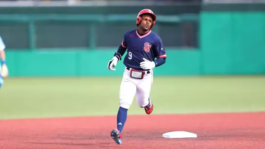 Jon LeGrande rounds second after blasting a 3 run homer