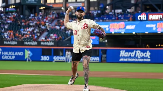 Dylan Johnson threw out an honorary pitch prior to the Mets game against the Braves
