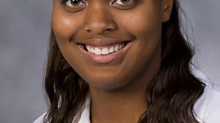 Tina Robinson Sets School Hammer Record