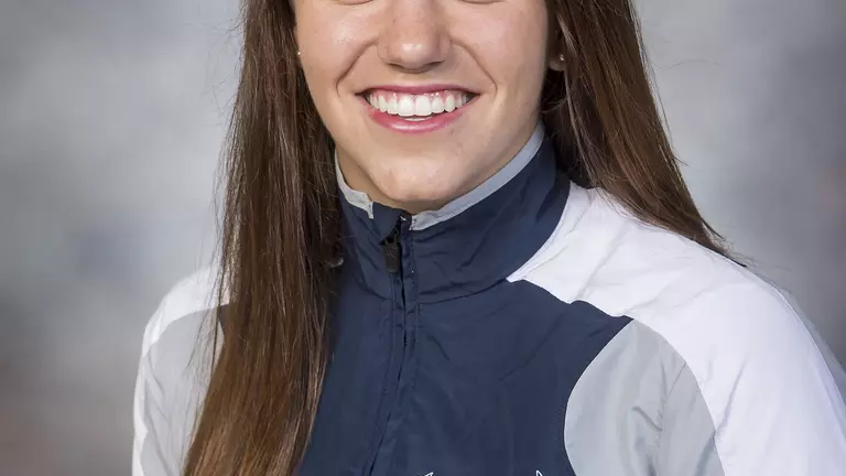 Casey Clark Leads Six Owl Swimmers To Scholar All-America Honors