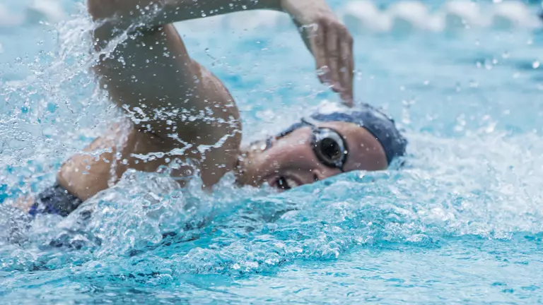 Swimmers Compete at U.H. Friday-Sunday
