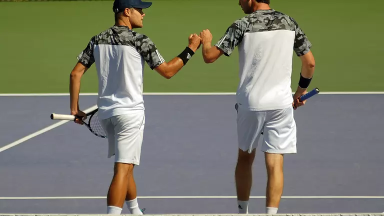 Bennett and Warren Drop NCAA Opener