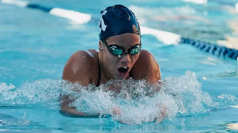 Swimmers Storm To Home Meet Title