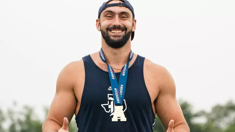 Welsh Claims Discus Title; Rice Finishes Third