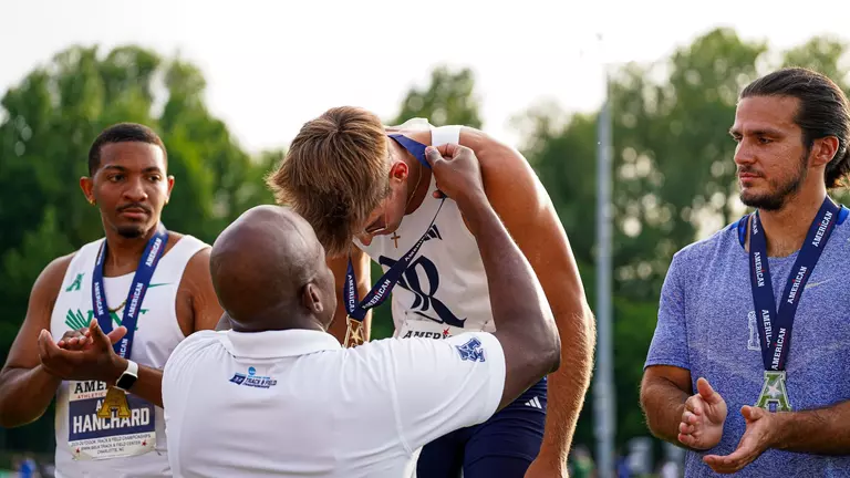 Henry Takes Javelin Title; Owls Lead AACs After Day One