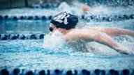 Archibald Wins 100 Fly; Owls Move Into Third at NIC