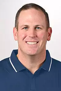 Head shot of Richmond football's offensive line coach/run game coordinator Keegan Kennedy