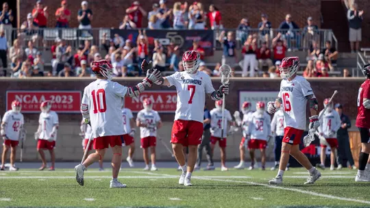Joe Sheridan celebrates a goal with Gavin Creo during Richmond's Atlantic 10 semifinal win over UMass on April 30,2026
