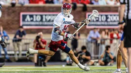 Jack Ricciardi carries the ball against Duke on May 9, 2026