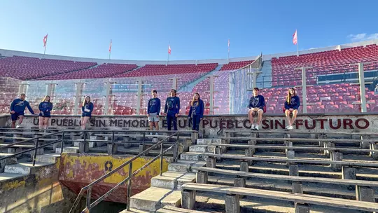 Spider student-athletes pose in Chile's Estadio Nacional