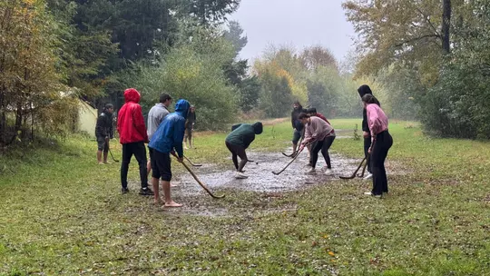 A group of Spider student-athletes participate in a game with indigenous peoples in Chile