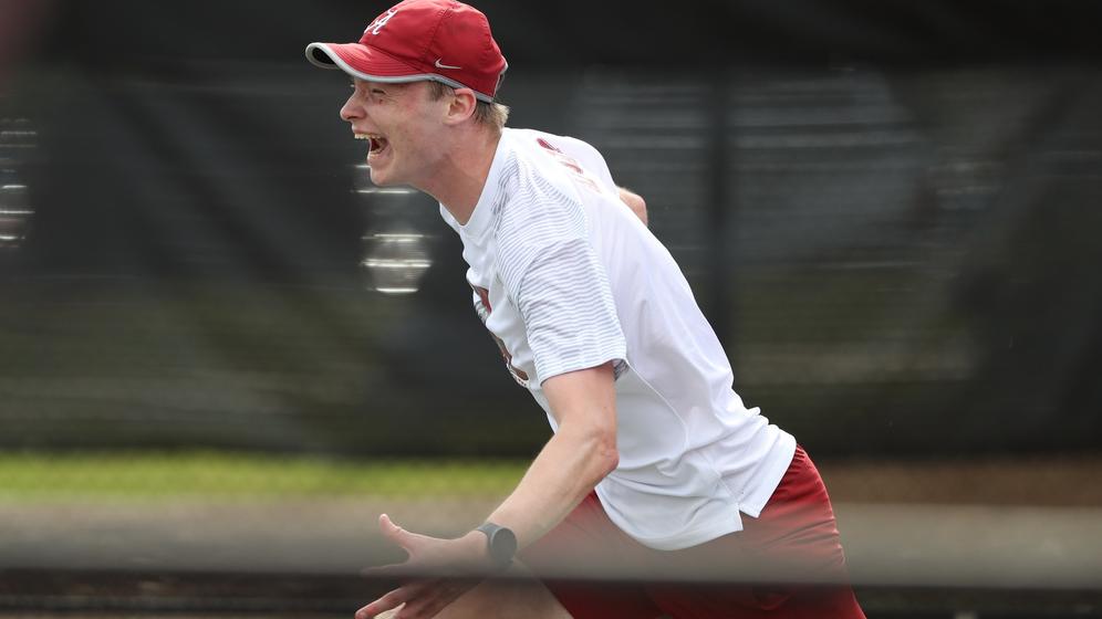 Alabama men's tennis player Roan Jones runs to his team in celebration after their big win against Texas A&M at The University of Alabama Tennis Stadium in Tuscaloosa, AL on Sunday, Apr 14, 2024.
