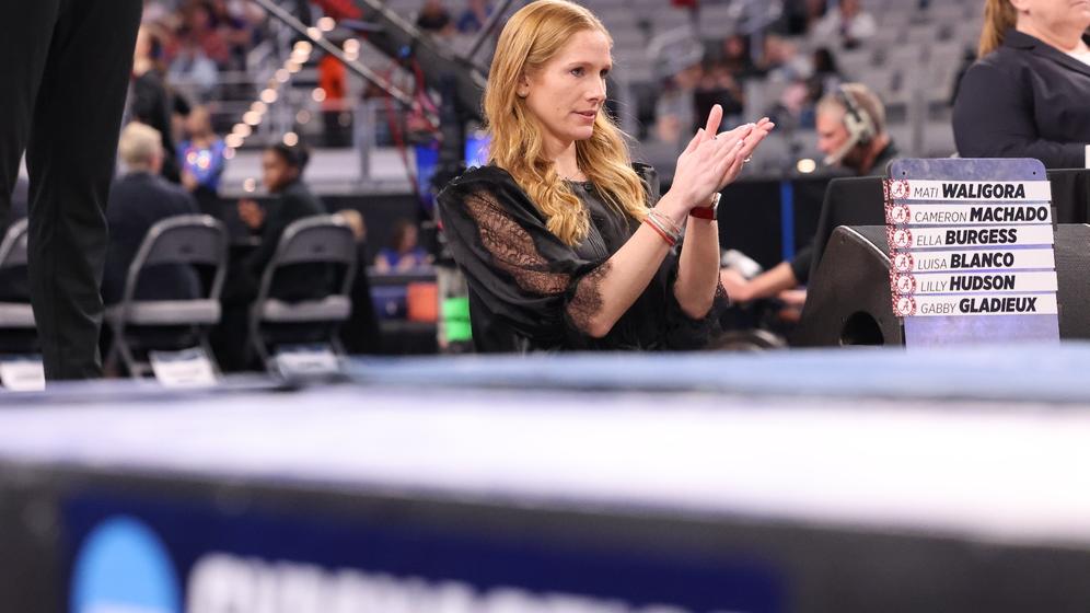 Alabama Head Coach Ashley Johnston cheers on her team during the NCAA National Semifinal at Dickies Arena in Fort Worth, TX on Thursday, Apr 18, 2024. 
