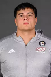 Samuel Henry. A Media Day was held today for the SHU Women's Equestrian, Men's Ice Hockey, Men's Wrestling, and Women's Rowing teams at the Martire Family Arena, Sacred Heart Universary, Fairfield, CT. Tuesday, September 1, 2026. Photo by: Mark F. Conrad