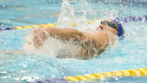 South Dakota State swimmer Colby Williams competes in the backstroke