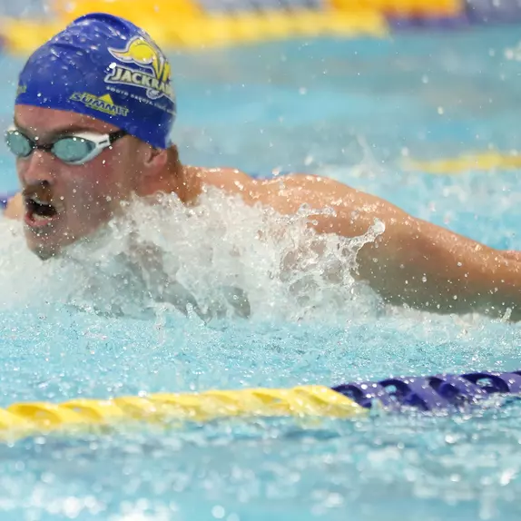 South Dakota State swimmer Braxton McGrath competes in the butterfly events.