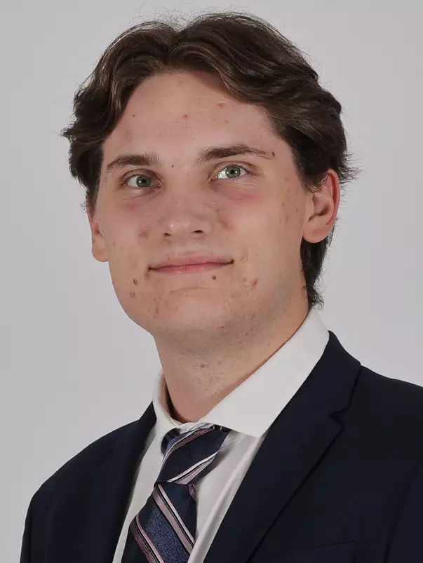 Taut Tubelis Official Headshot 2024-25