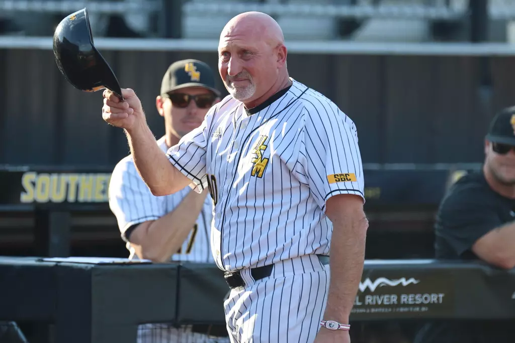 Southern Miss Head Coach Scott Berry being congratulated on his 500th win in a game between the Southern Miss Golden Eagles and James Madison Dukes. April 14, 2023 (Joe Harper/bgnphoto.com)