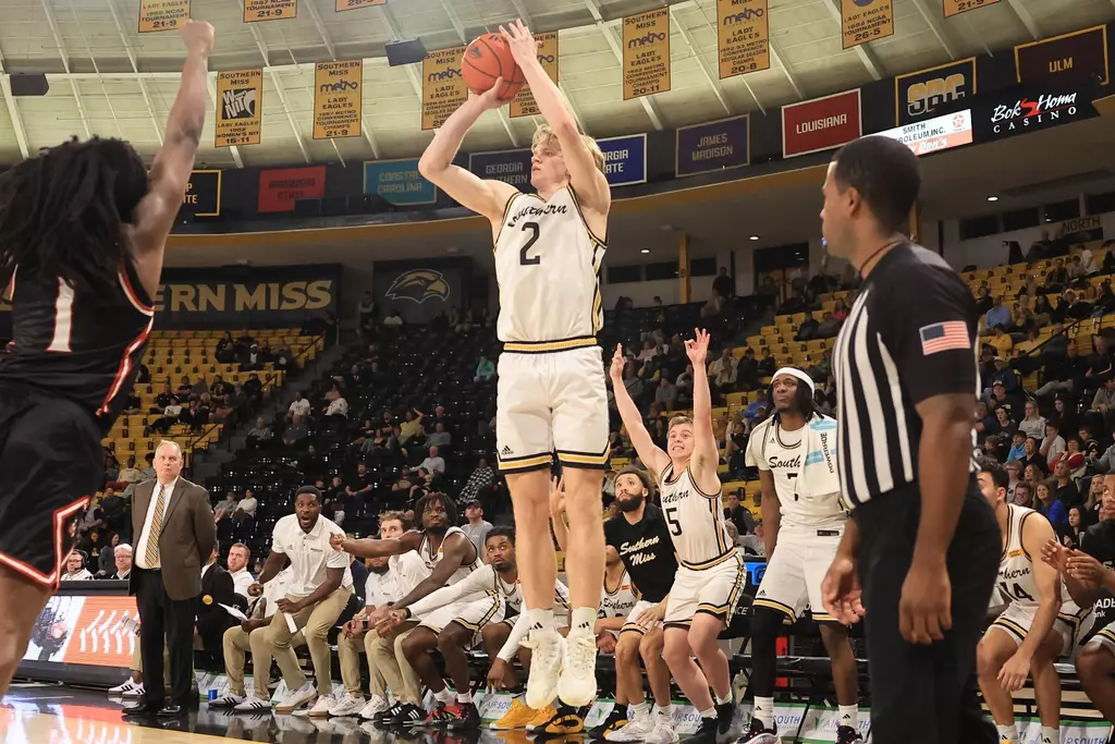 Southern Miss Golden Eagles guard Brewer Carruth (2) shoots a three point shot In a game between the Southern Miss Golden Eagles and the William Carey Crusaders in a NCAA Men's basketball game. December 30, 2024 (Joe Harper/bgnphoto.com)