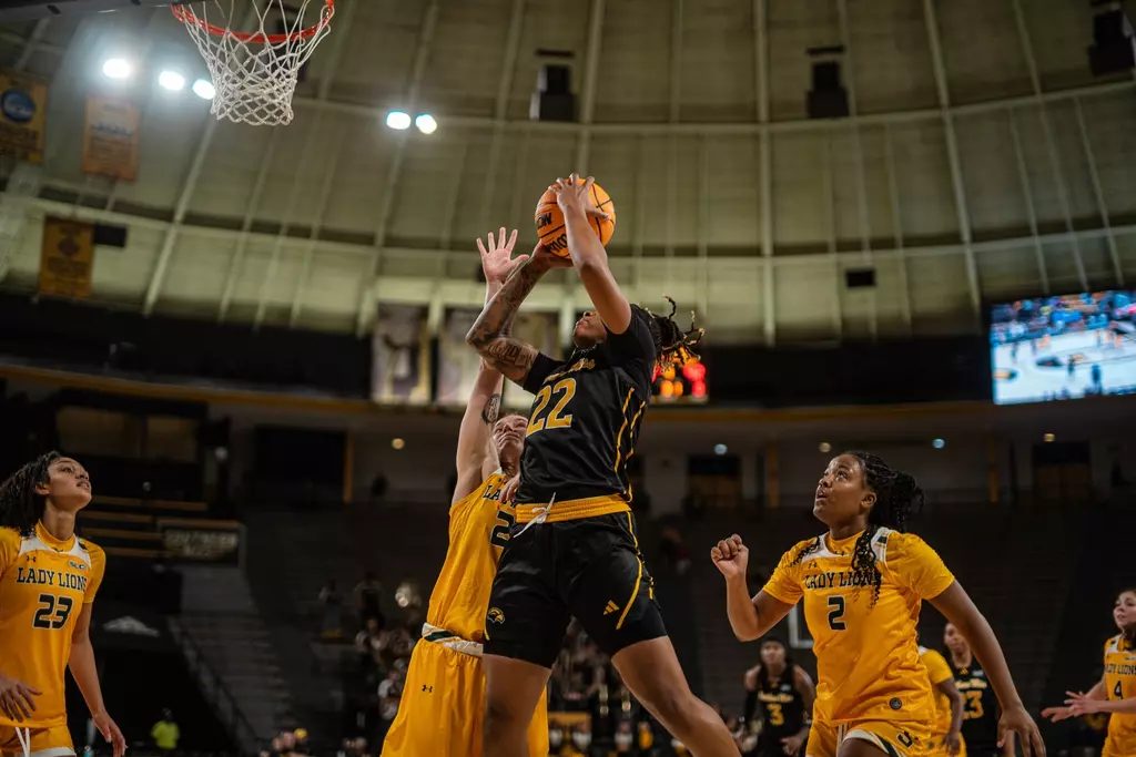 Sakyia White attacks the basket against Southeastern
