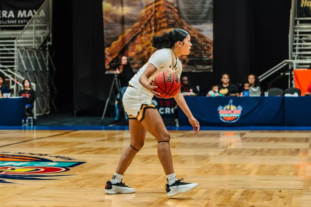 Meloney Thames with the ball against North Carolina State