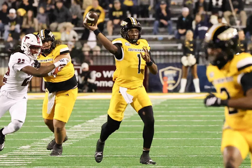 Southern Miss Golden Eagles quarterback Braylon Braxton (1) throws a pass in a game between Southern Miss Golden Eagles and Troy Trojans and in the NCAA Men's Basketball game. November 29, 2025 (Joe Harper/bgnphoto.com)