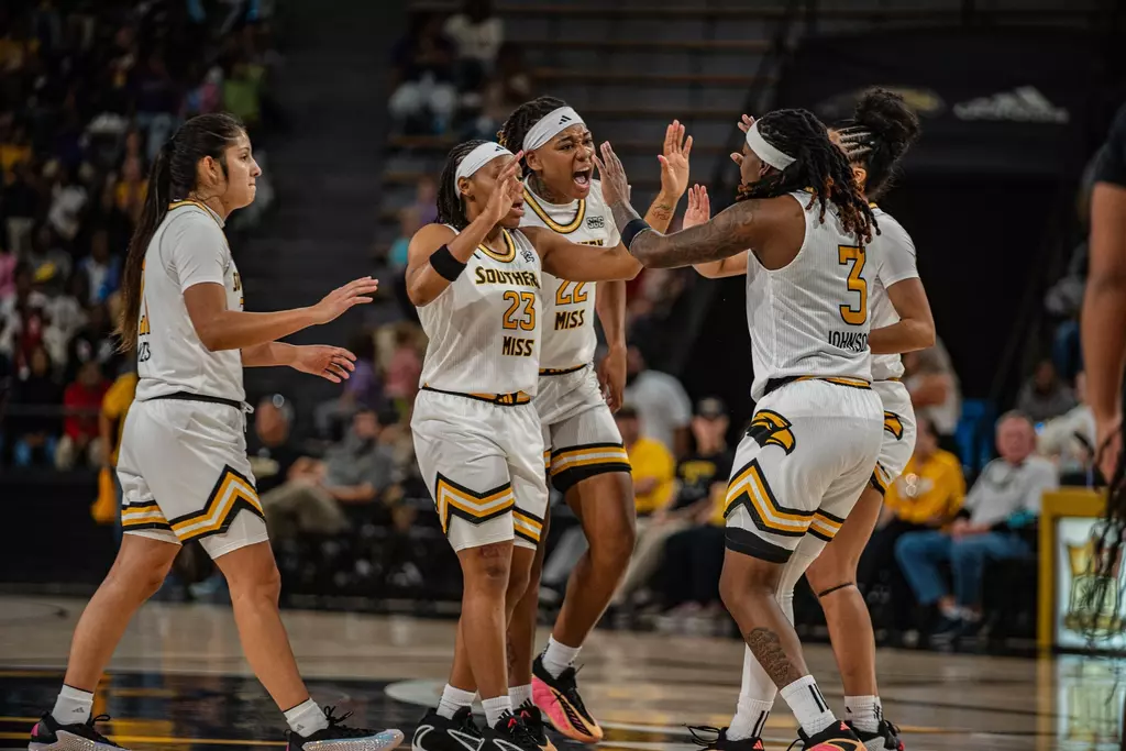 Lady Eagles celebrate against William Carey