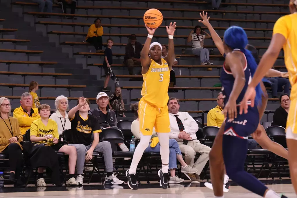 Southern Mississippi Golden Eagles guard Jakayla Johnson (3) shoots a three point shot in a game between Southern Miss Golden Eagles and South Alabama Jaguars in a NCAA Women's Basketball game. December 18, 2025 (Joe Harper/bgnphoto.com)