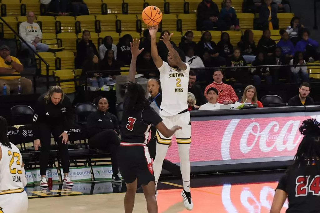 Southern Mississippi Golden Eagles guard Ramiah Augurson (2) shoots a three point shot in a game between Southern Miss Golden Eagles and Louisiana in a NCAA Women's Basketball game. December 20, 2025 (Joe Harper/bgnphoto.com)