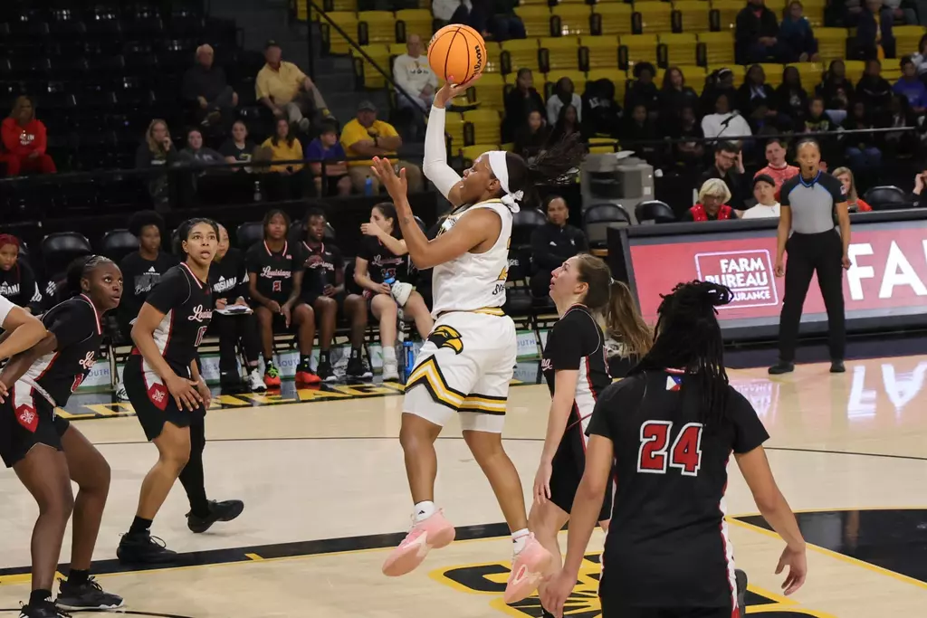 Southern Mississippi Golden Eagles guard Hayleigh Breland (23) floats one to the basket in a game between Southern Miss Golden Eagles and Louisiana in a NCAA Women's Basketball game. December 20, 2025 (Joe Harper/bgnphoto.com)