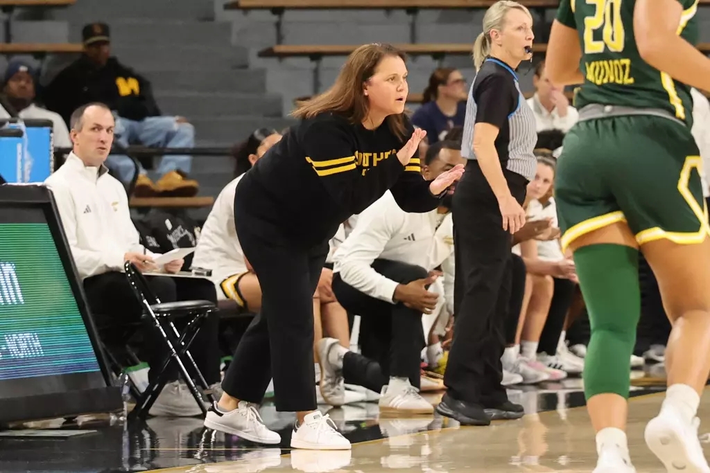 Southern Miss Lady Eagles head coach Missy Bilderback encourages her team in a game between Southern Miss Golden Eagles and UAB Blazers and in the NCAA Women's Basketball game. December 07, 2025 (Joe Harper/bgnphoto.com)