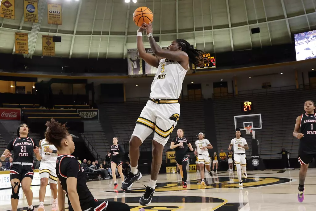 Southern Mississippi Golden Eagles guard Jakayla Johnson (3) with a shot after the steal in a game between Southern Miss Golden Eagles and Arkansas State in a NCAA Women's Basketball game. January 01, 2026 (Joe Harper/bgnphoto.com)