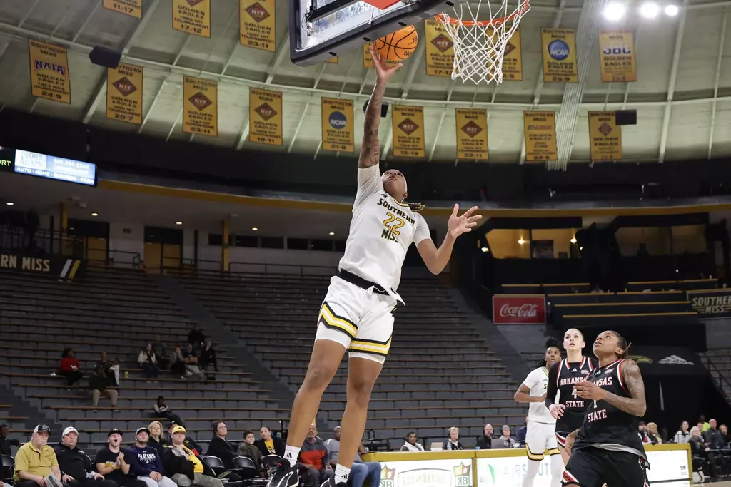 Southern Mississippi Golden Eagles forward Sakyia White (22) with a layup in a game between Southern Miss Golden Eagles and Arkansas State in a NCAA Women's Basketball game. January 01, 2026 (Joe Harper/bgnphoto.com)