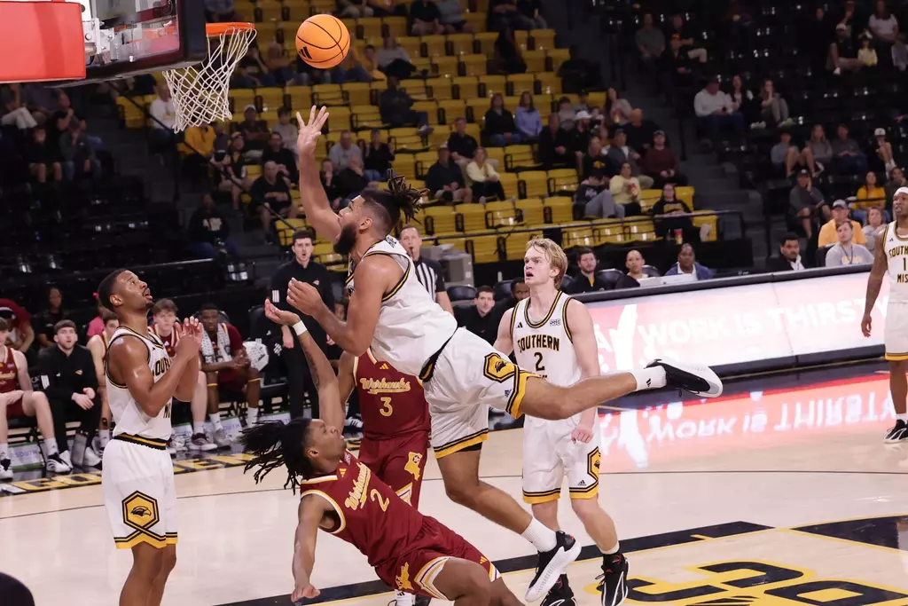 Southern Mississippi Golden Eagles forward Djahi Binet (15) finishes the shot in a game between Southern Miss Golden Eagles and Louisiana Monroe Warhawks in a NCAA Men's Basketball game. January 10, 2026 (Joe Harper/bgnphoto.com)