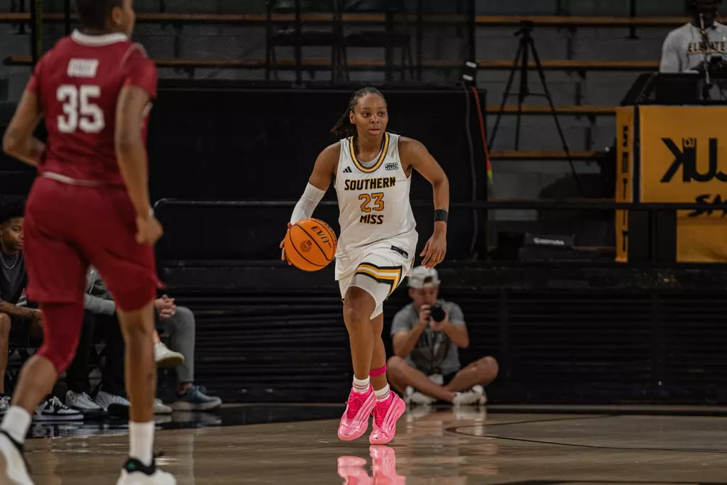 Hayleigh Breland moves the ball against Troy