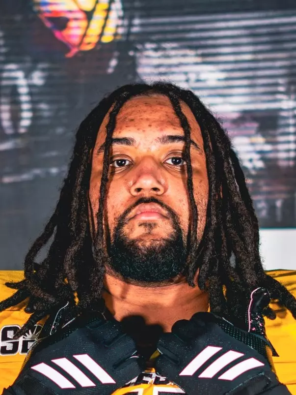 Christian Young Signing Head Shot