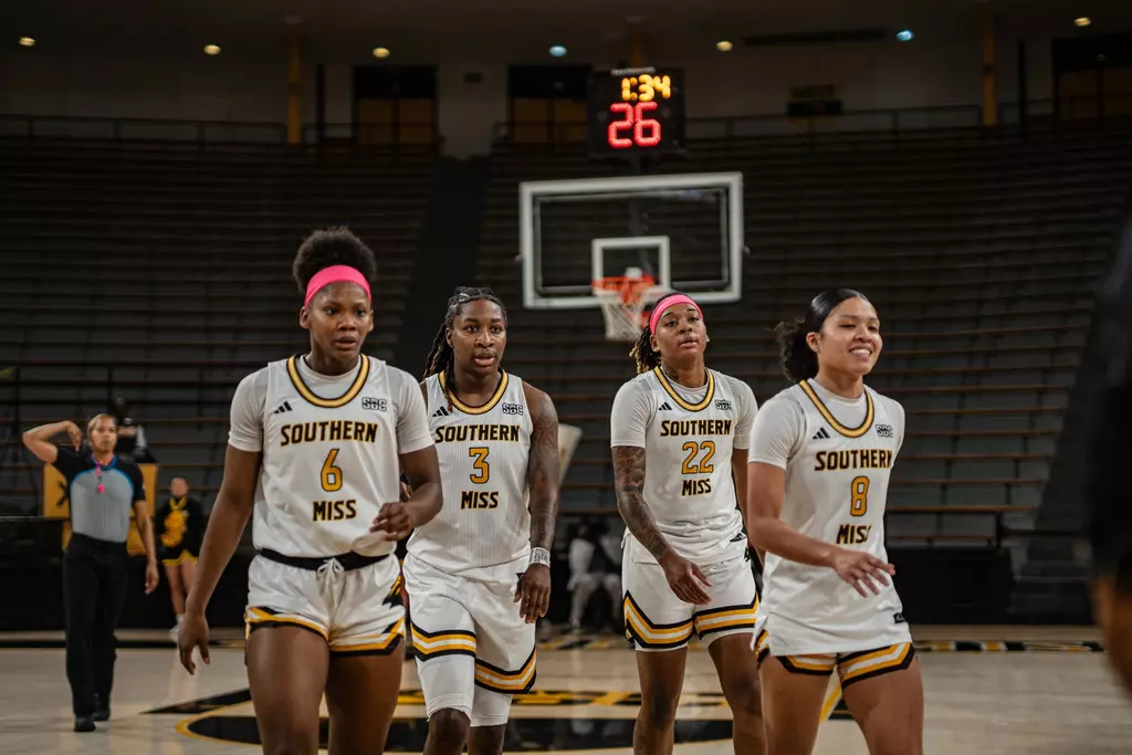 Brikayla Gray, Jakayla Johnson, Sakyia White and Meloney Thames leave the floor