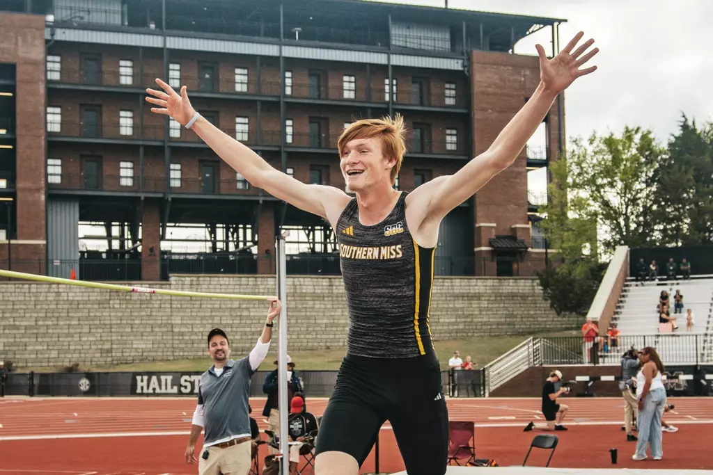 Tyler Hughes celebrates his win in the high jump event at the Bulldog Alumni Relays on March 27th, 2026 in Starkville.