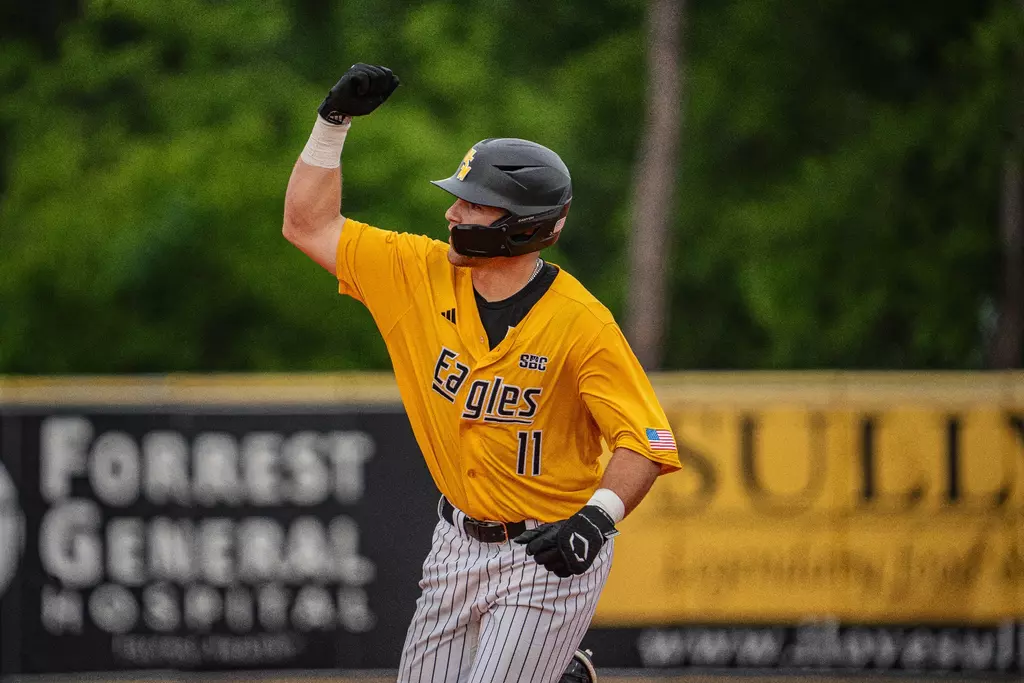 Davis Gillespie celebrates his 8th Inning Homerun
