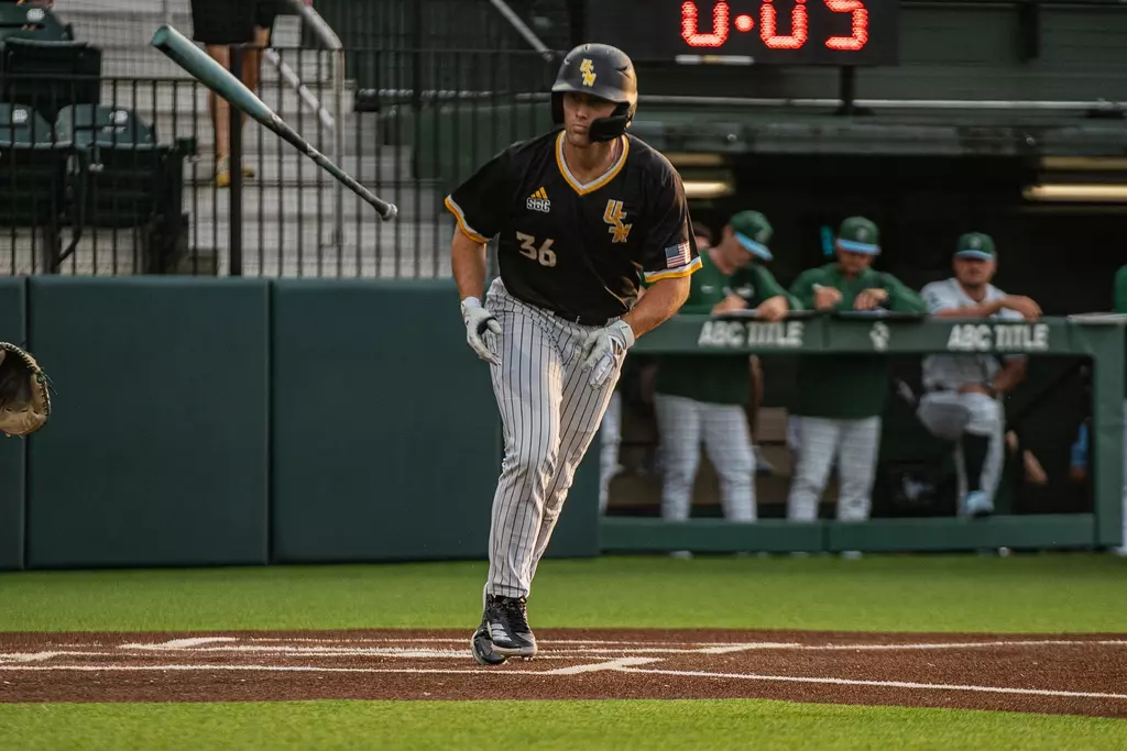 Tucker Stockman heads to first after he gets walked