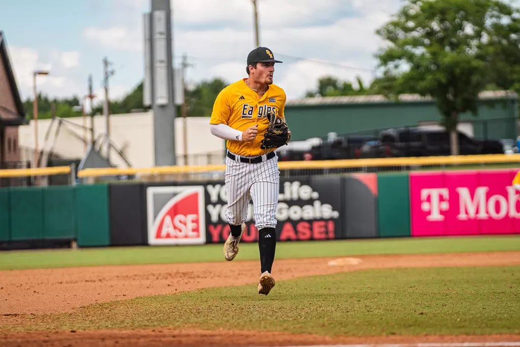 Kyle Morrison returns to the dugout after a successful outing