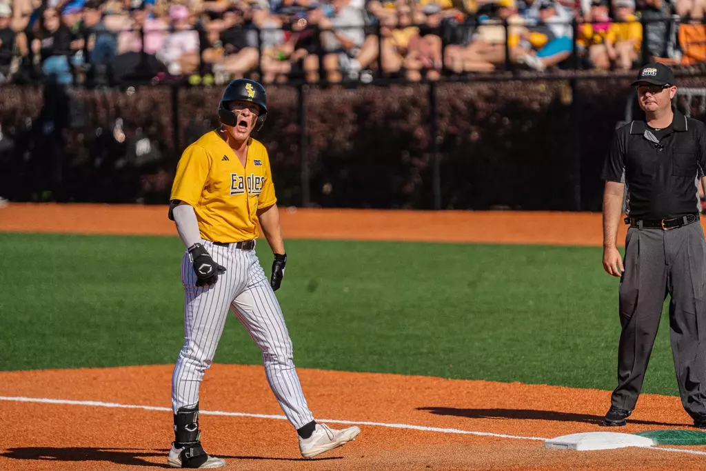Ben Higdon celebrates getting on base