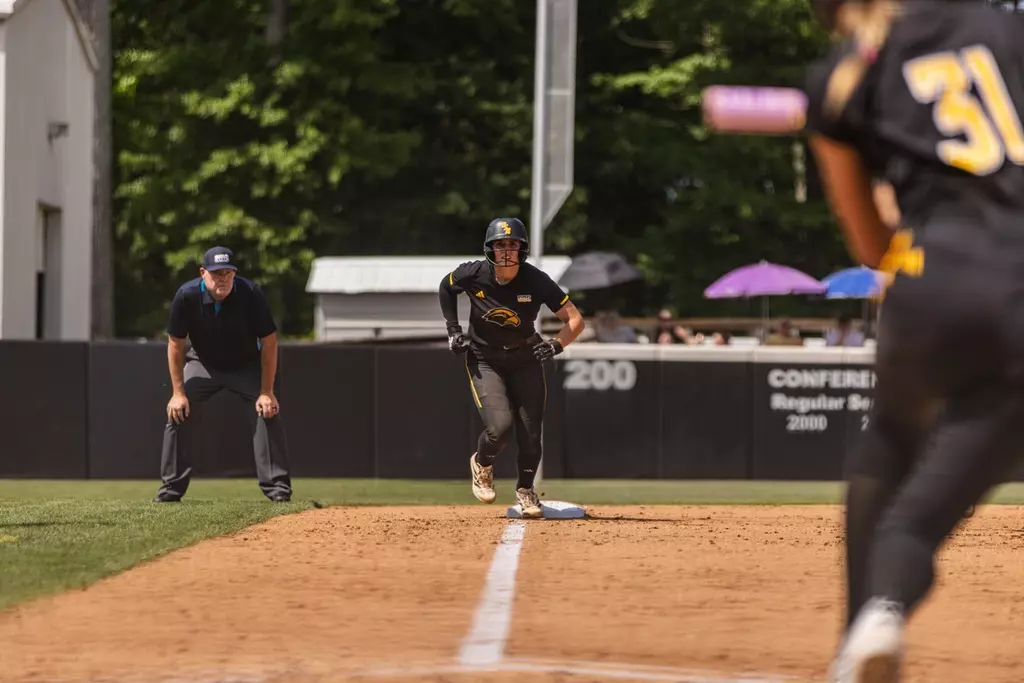 Abbi Troquille on third base