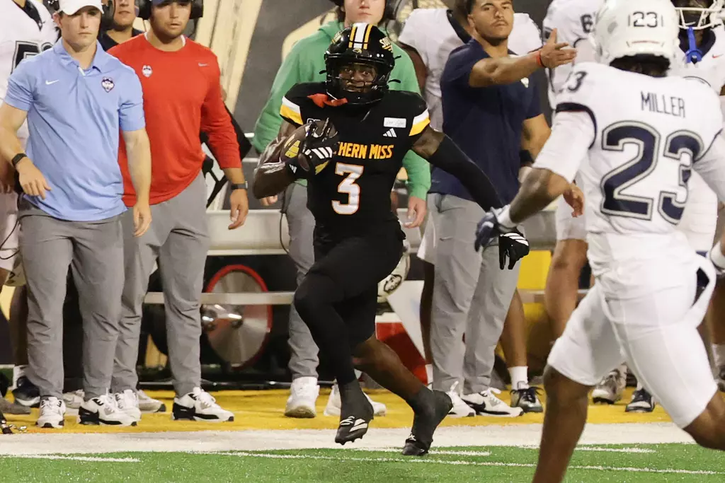 Southern Mississippi Golden Eagles wide receiver Mj Johnson (3) runs down the sideline after the catch in a NCAA game between Southern Miss Golden Eagles and UConn Huskies at Carlisle-Faulkner Field at Renasant Stadium. September 19, 2026 (Joe Harper/bgnphoto.com)