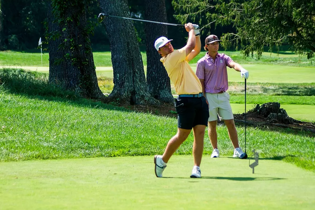 John Markow tee'ing off at the JT Poston