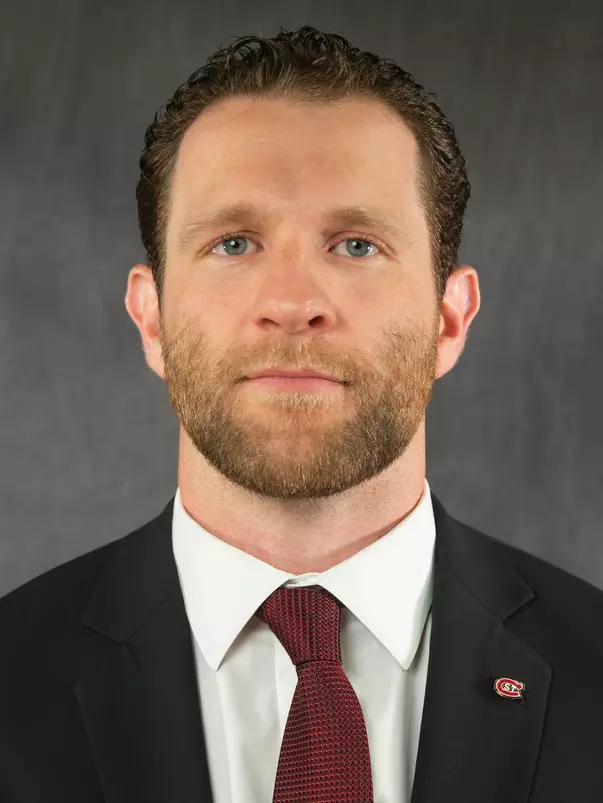 CLARK KUSTER HEADSHOT 26-27
