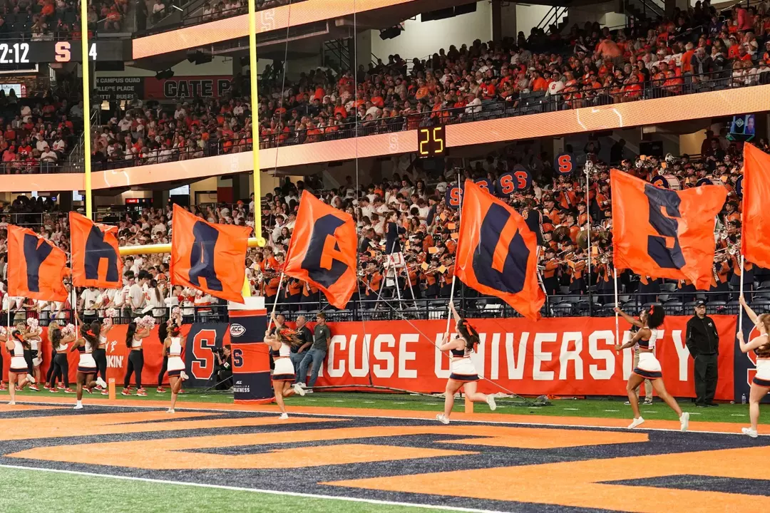 Syracuse fans celebrate a 'Cuse score.