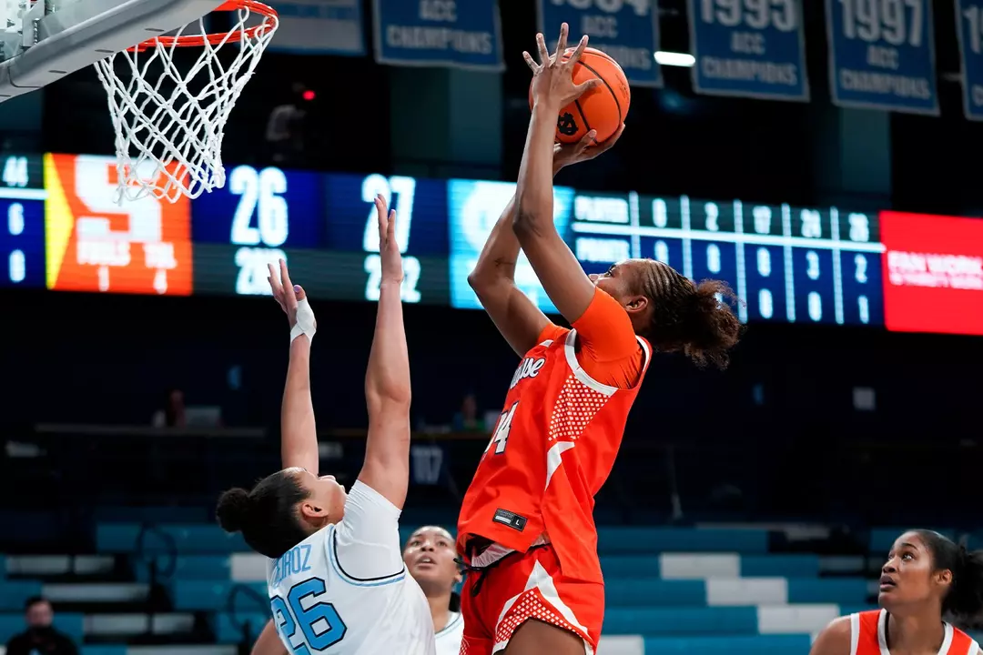 Uche Izoje takes a jump shot against UNC